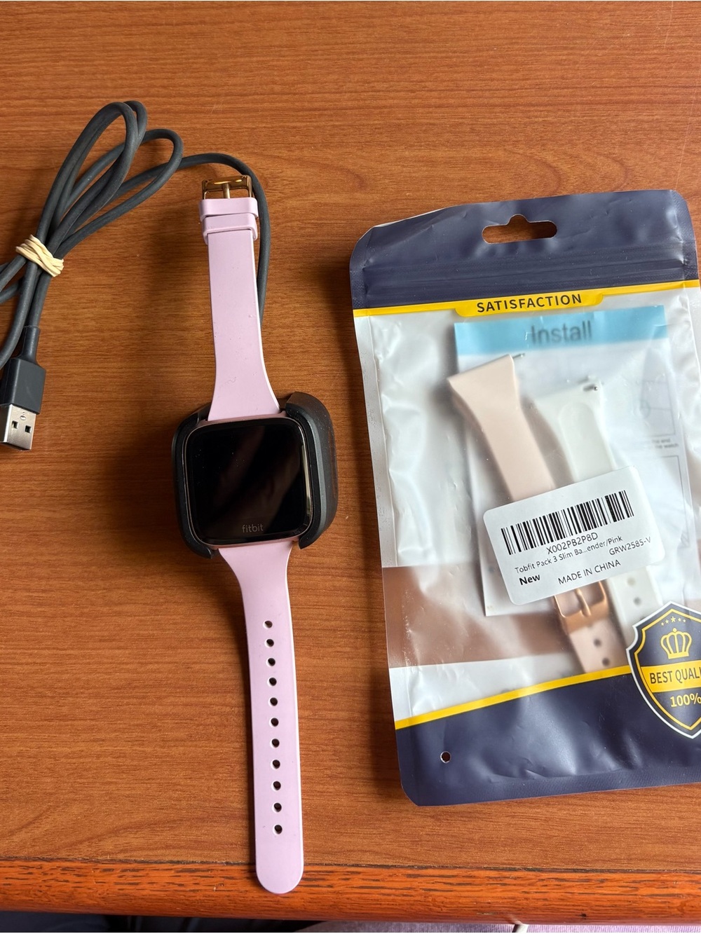 fitbit Pink Smartwatch with Extra Light Pink Band